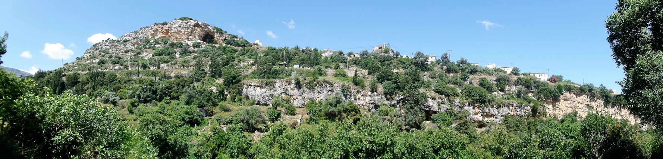 Panoramic view across the green Mili Gorge and surrounding hillside near Rethymno, Crete