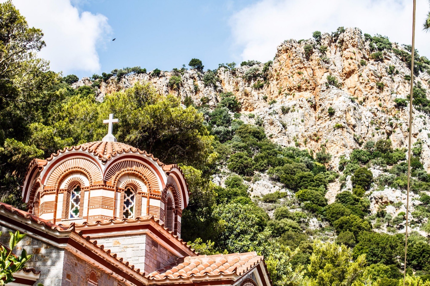 The ornate Byzantine dome rising against the gorge cliffs